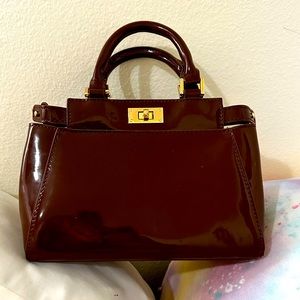 Shiny mini purse clean like new condition. Classy